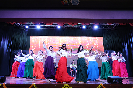 Students performing during a JNIS programme