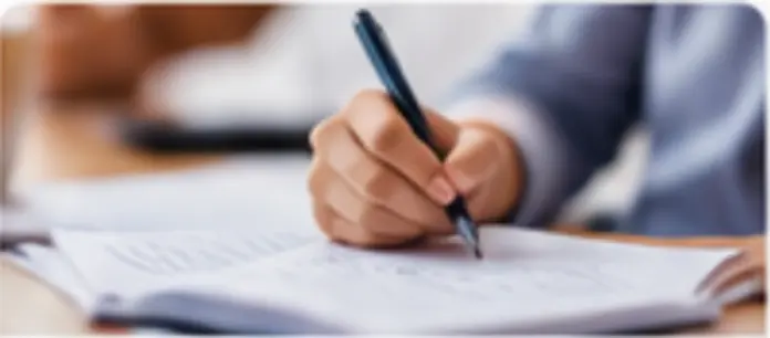 Student writing during an SAT preparation workshop